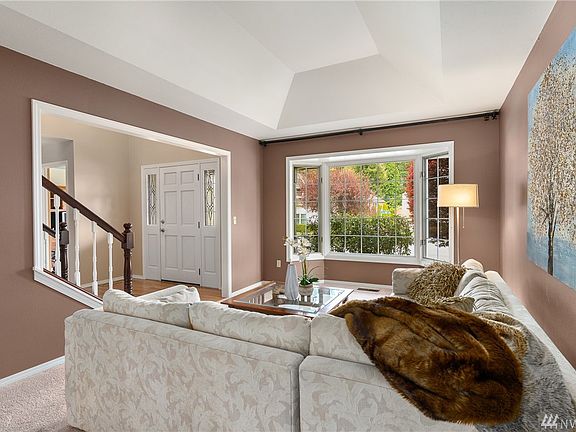 Home features six-panel doors, coffered ceiling, recessed lighting and mostly rollout windows.