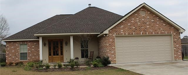 41235 COVEY RUN, HAMMOND,LA FRONT VIEW.  THIS CUSTOM BUILT HOME IS ONLY 1,5 YEARS OLD