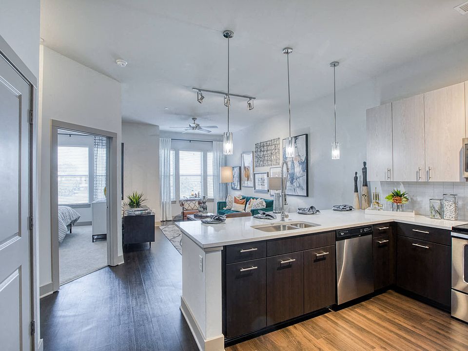 Contemporary finishes include wood and tile flooring