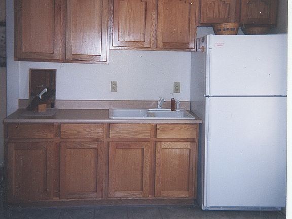Oak Cabinets & Ceramic Tile Floor