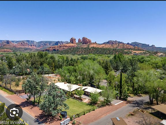 Aerial view of residence with views of Cathedral Rock.