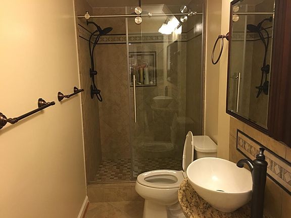 Bathroom with rain shower and heated floor 