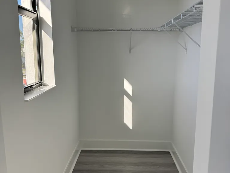 second floor bedroom walk in closet