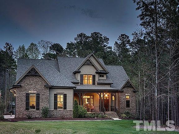 Storybook setting on large, 1.6 acre lot, extensive stacked stonework on this custom home resulting 