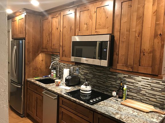 NEW GRANITE KITCHEN WITH LUXURY APPLIANCES