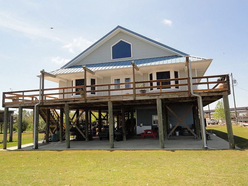 Front view of house
						:
						Nice view of Pass Manchac, Galva Canal, Lake Maurepas