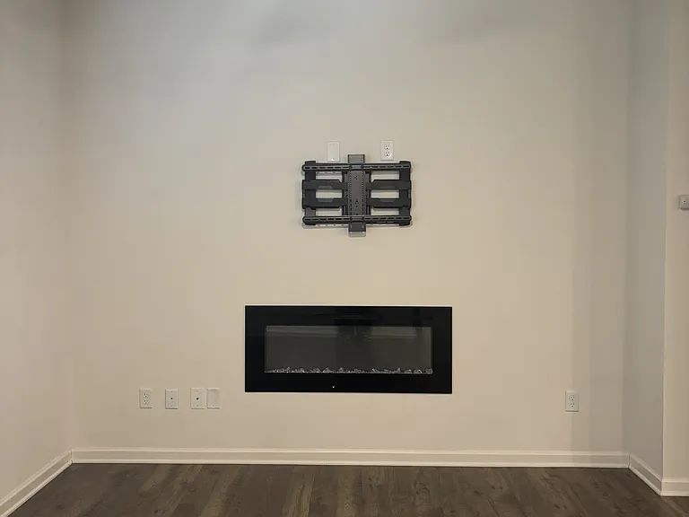 Electric Fireplace enlarged ceiling fan, and TV mount ready to go!