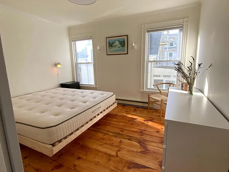 Primary bedroom with organic king mattress by Avocado.