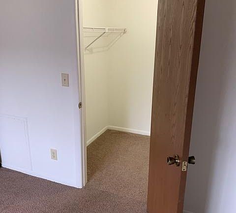 Walk in closet in bedroom