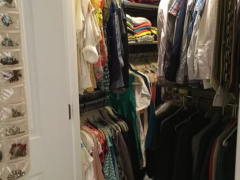 Master bedroom closet with Elfa closeting system installed