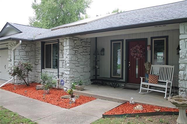 Tastefully landscaped for low maintenance yet pleasing to the eye. Enjoy an evening on the front porch, visiting with neighbors