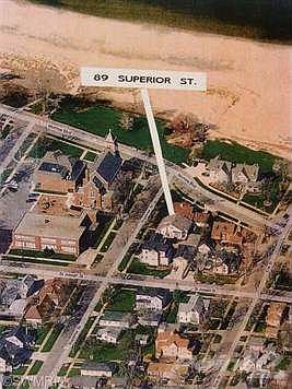 89 Superior sits directly accross from St Basils church and school. Lake and beach views are seen from front porch, rear deck, main floor and second floor windows. It's the first house on Superior Street.