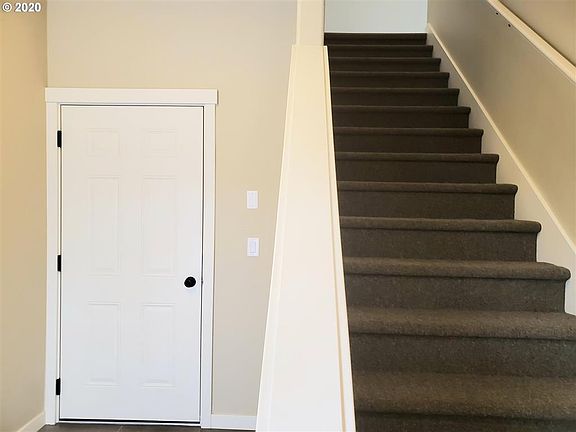 Steps from garage to first floor