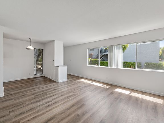This is a view from the living room, showing the sunlight streaming in from our 11 foot windows!