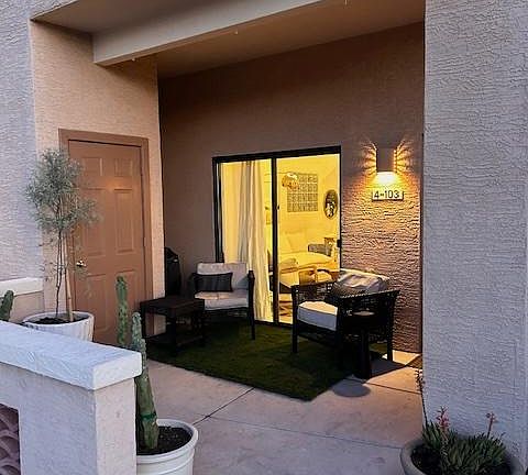 Entry & sitting area with outdoor BQ and plants facing mountain views