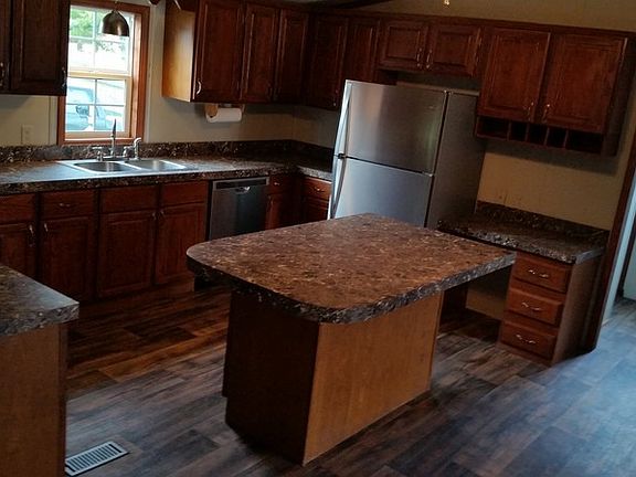 Kitchen : Kitchen leads to laundry room and back door.