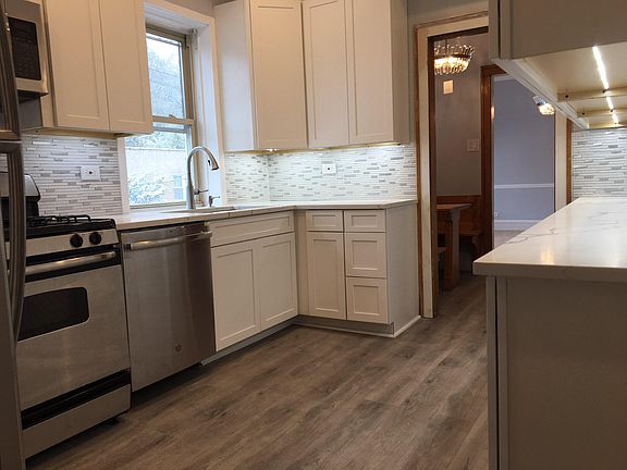 Brand new, completely renovated kitchen with quartz countertops and all new appliances.