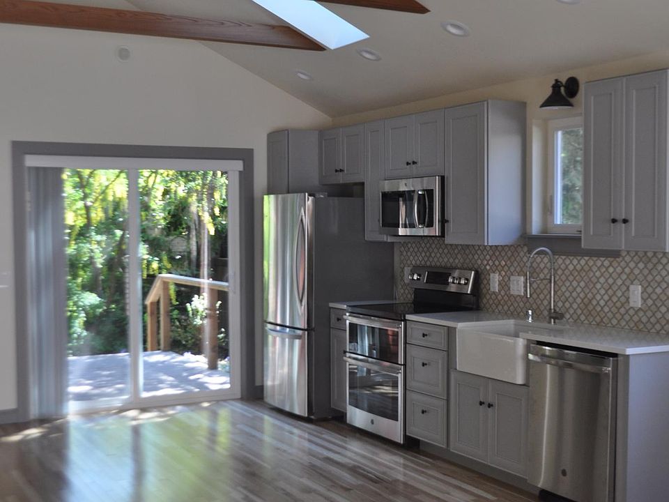 Open beam ceilings and skylights in the "eat in" kitchen.