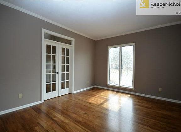 Office with Hardwood Floors and French Doors