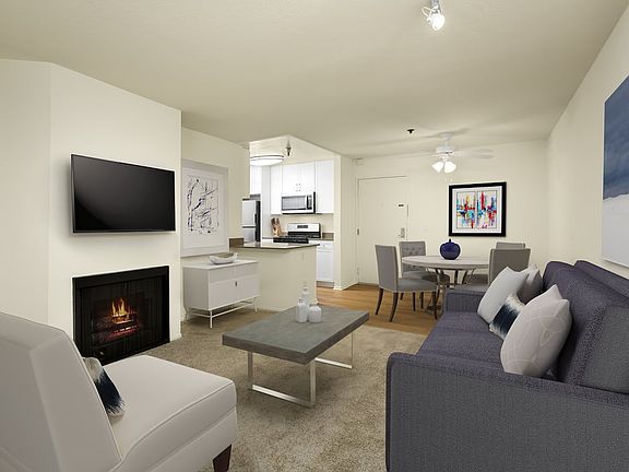 Renovated I kitchen, dining, and living areas