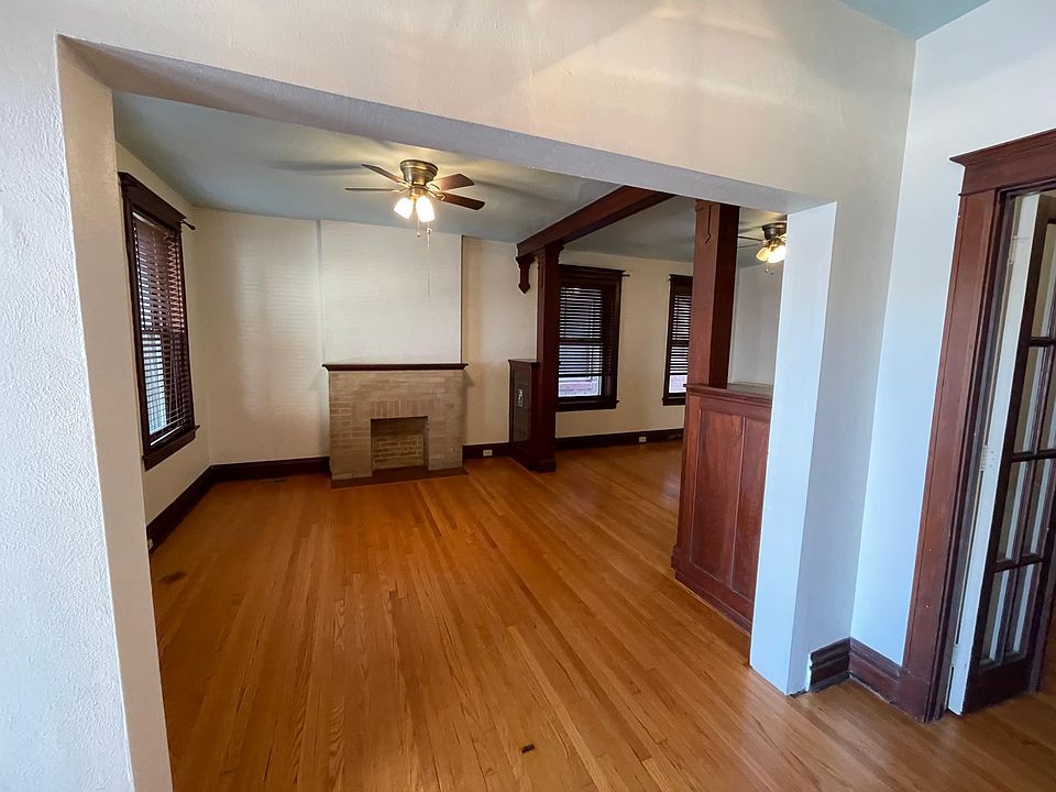 Living area with decorative fireplace.