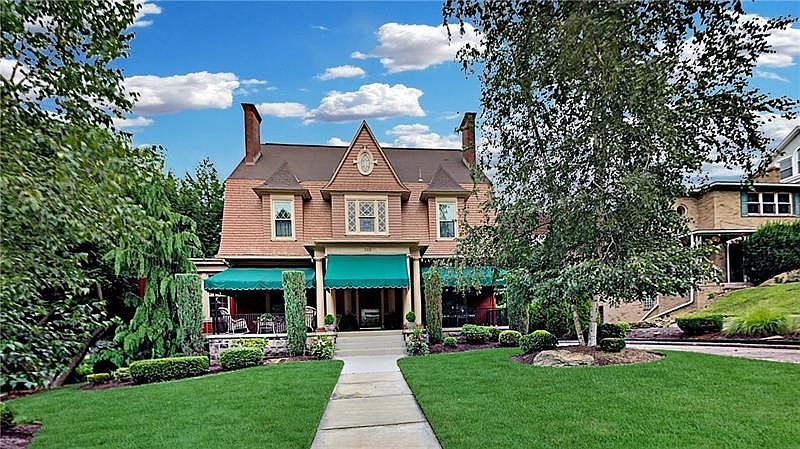 Grand Ben Avon home with full-length front porch