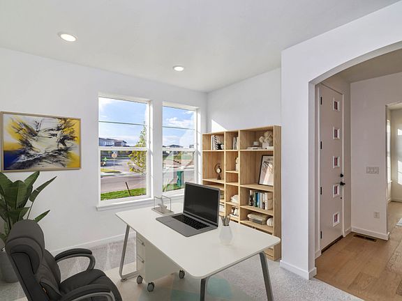 The two-story Westport features both a den and flex space directly off the entrance.