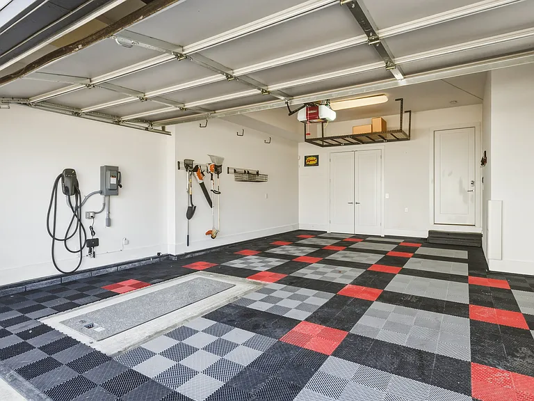 2 car garage plus plenty of storage.