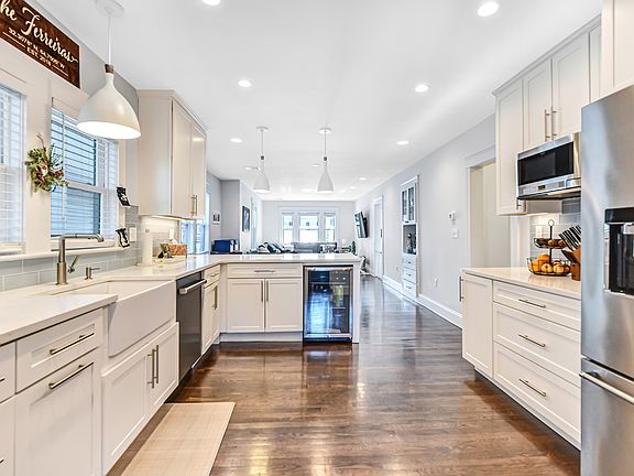 Open Kitchen/Dining/Living with built in wine fridge