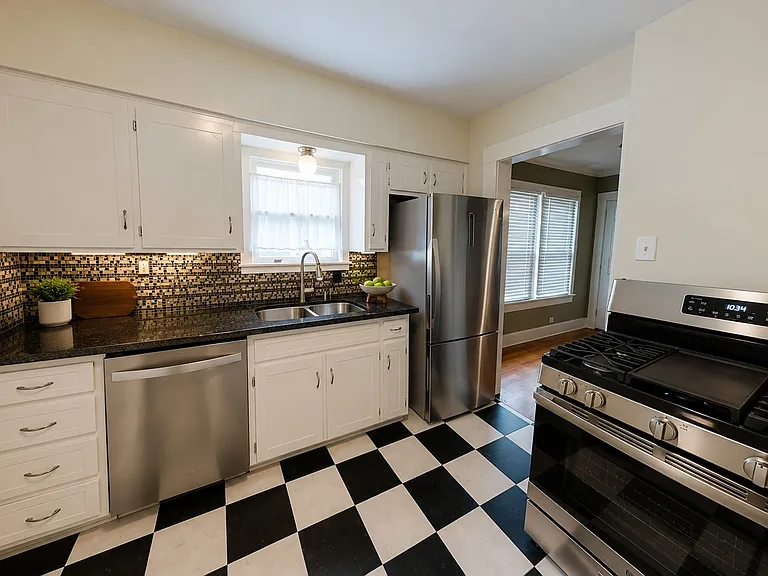 Kitchen with TWO frig and modern dishwasher and GAS stove for anyone who loves and prefers to cook with gas!
