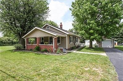 Beautiful Craftsman style home with a detached 1 car garage and a 36x24 finished garage around back.