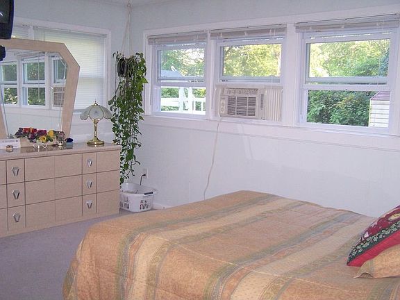 The master bedroom walks out to deck and hottub!