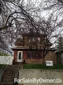 Exterior
						:
						Beautiful mature trees throughout the yard with privacy lilac shrub.