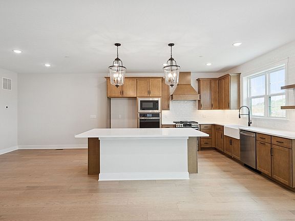 Kitchen with stylish floating shelves