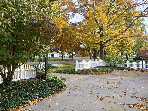 Fenced driveway and parking