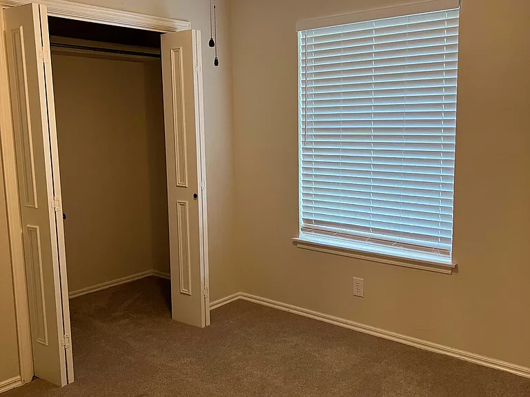 The second bedroom has wide stretched closets. Again lots of storage.
