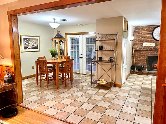 Dining area from Living Room with French doors to backyard deck