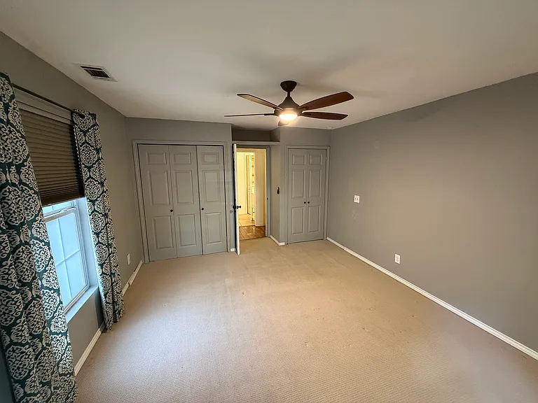 Primary bedroom with closets (downstairs)