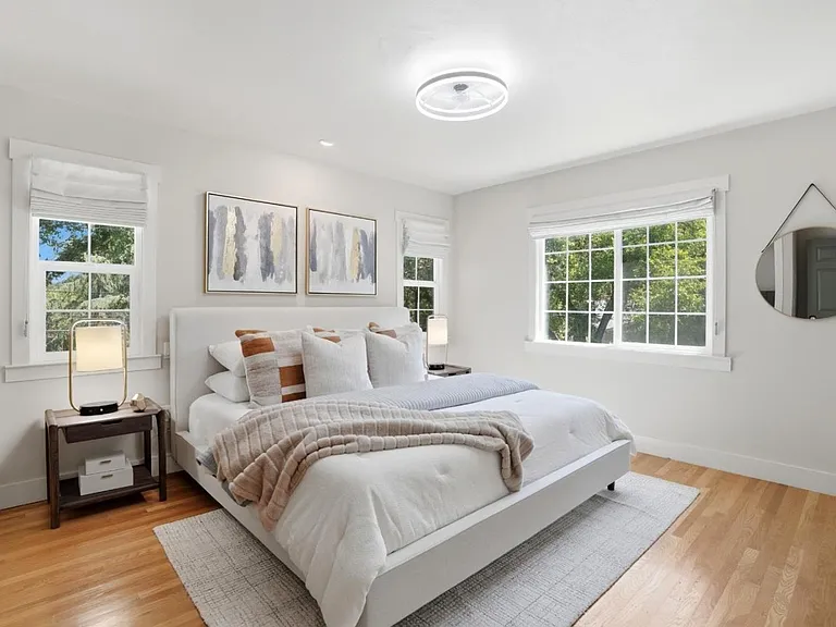 Serene primary suite with peaceful views