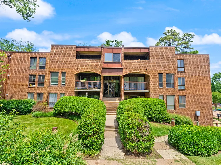 Rear entrance to building, convenient for the pool and back parking lot.