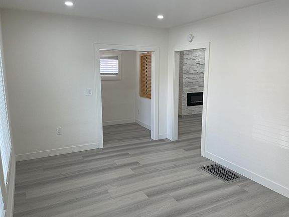 Living Room inside the house. On the left are the 2 large windows which faces the front yard.