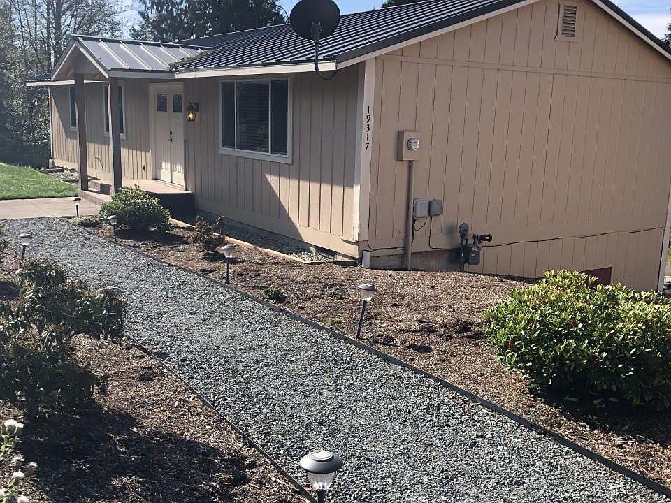 Walkway leading to front of the house.