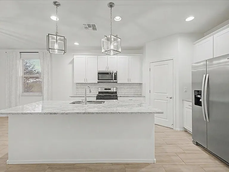 10315 W Robertson St — Photo 13