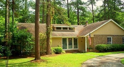 Contemporary home on almost an acre in town.