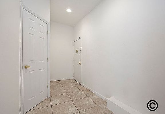 5th image of 437 E 12th St APT 10