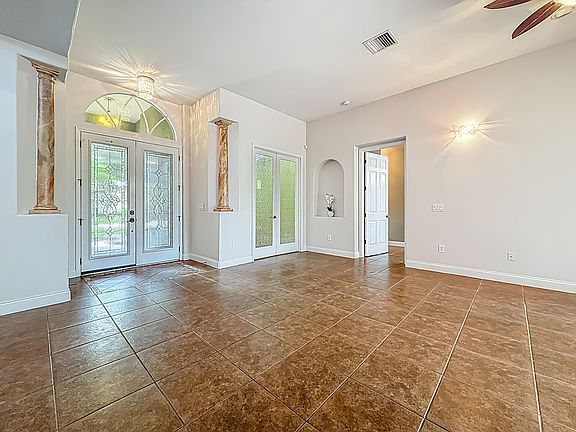 Foyer Showing Formal Living area /office and Master Bedroom