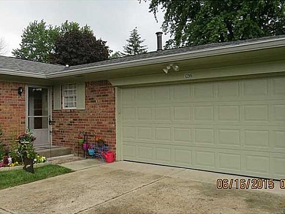 Exterior Front. New Garage Door