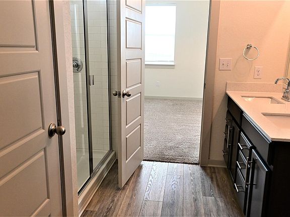 Master Bathroom- Double sink vanity, walk in shower, his/her walking in closets