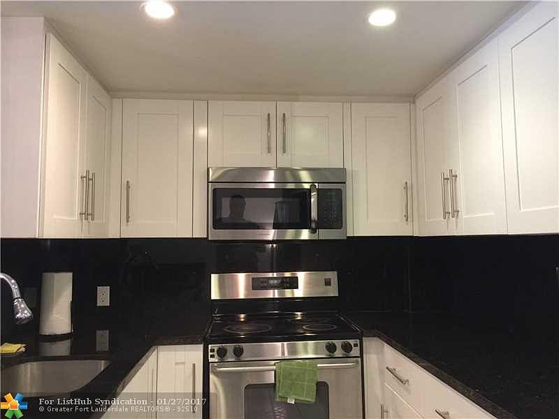 1st image of 3300 N Palm Aire Dr APT 209