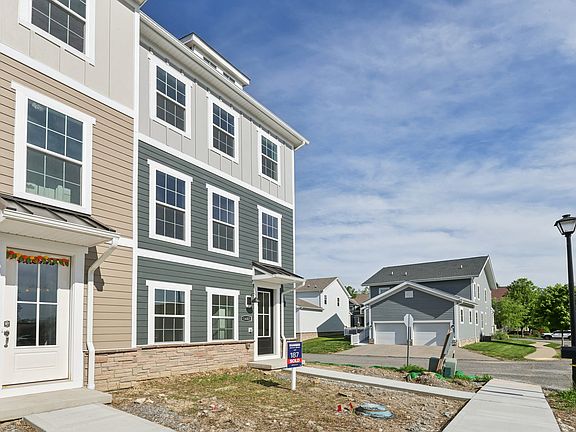 1402 COMMONS - Front / Side View of End Unit Townhome
